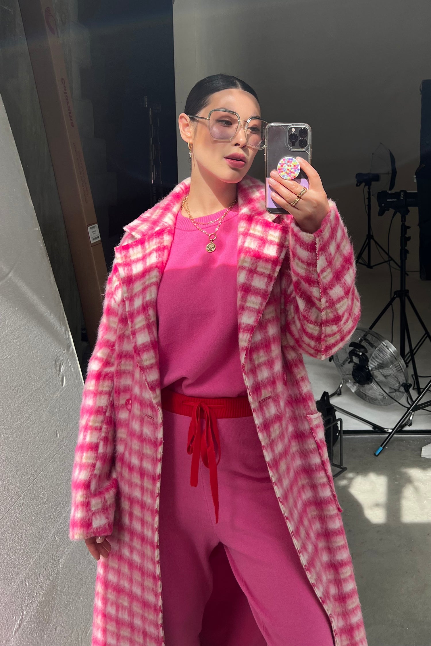 Model wearing Pink Check Zadie Coat standing facing the camera