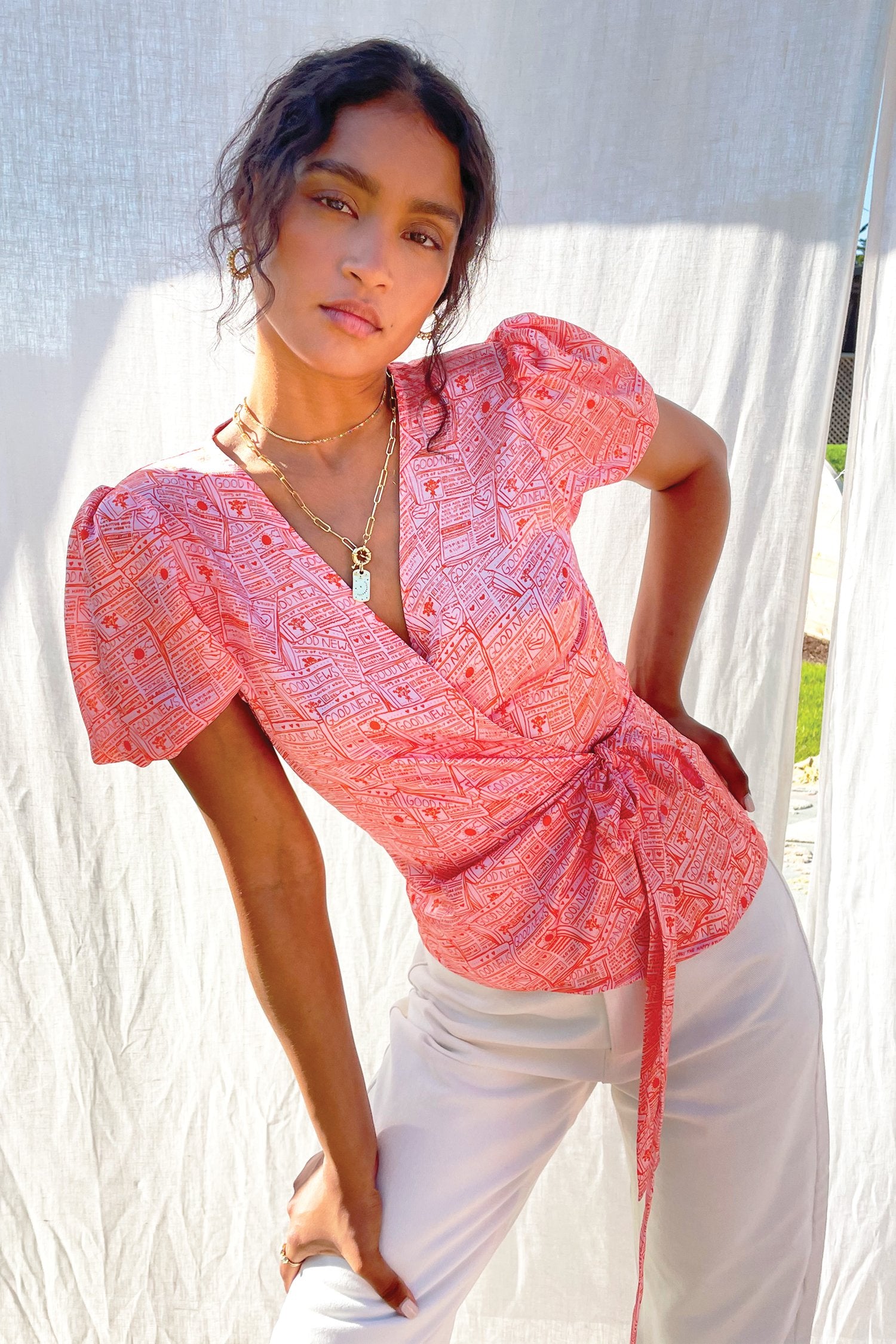 Pink-Good-News-Wrap-Top-£59