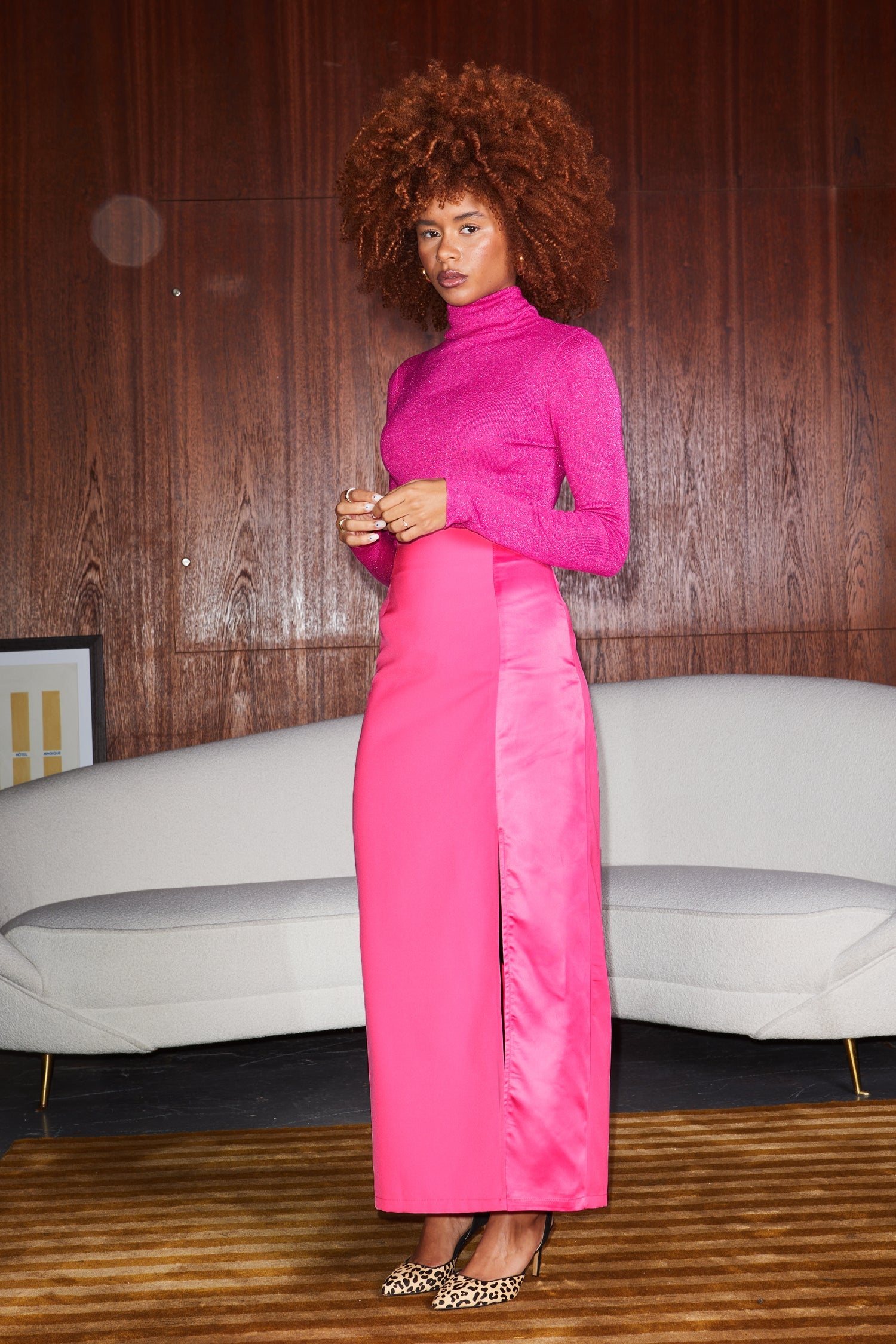 Model wearing Pink Maxi Split Skirt standing facing the camera