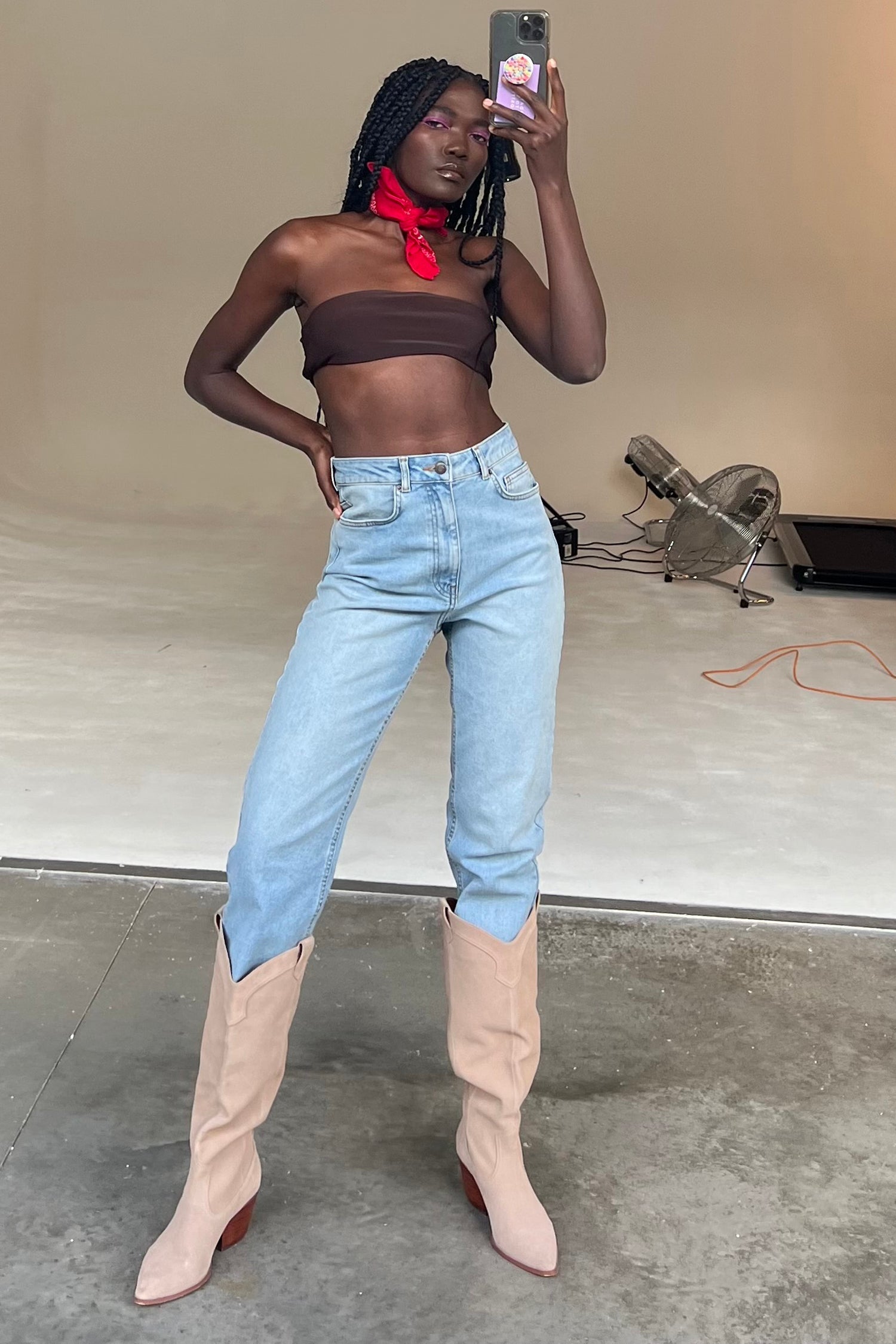 Model wearing Suede Cowboy Boot standing facing the camera