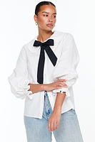 Thumbnail for Model wearing White Layla Shirt standing facing the camera 