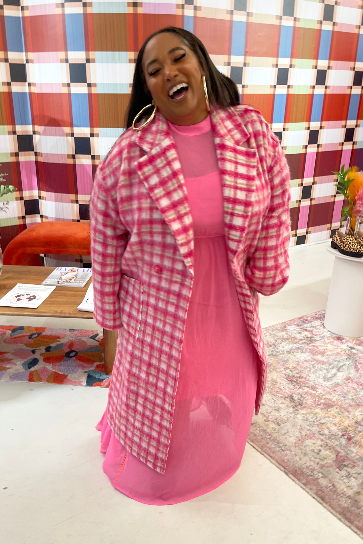 Model wearing Pink Check Zadie Coat standing facing the camera