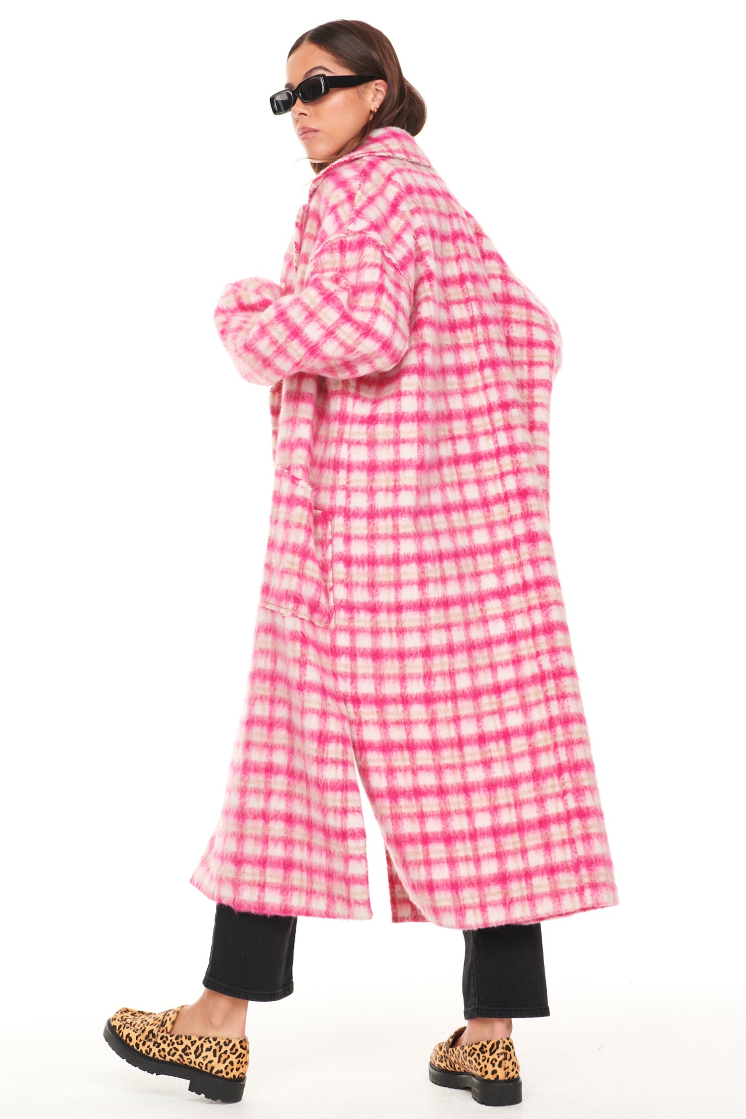 Model wearing Pink Check Zadie Coat standing facing away from the camera
