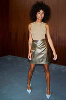 Thumbnail for Model wearing Gold Vegan Leather Mini Wrap skirt