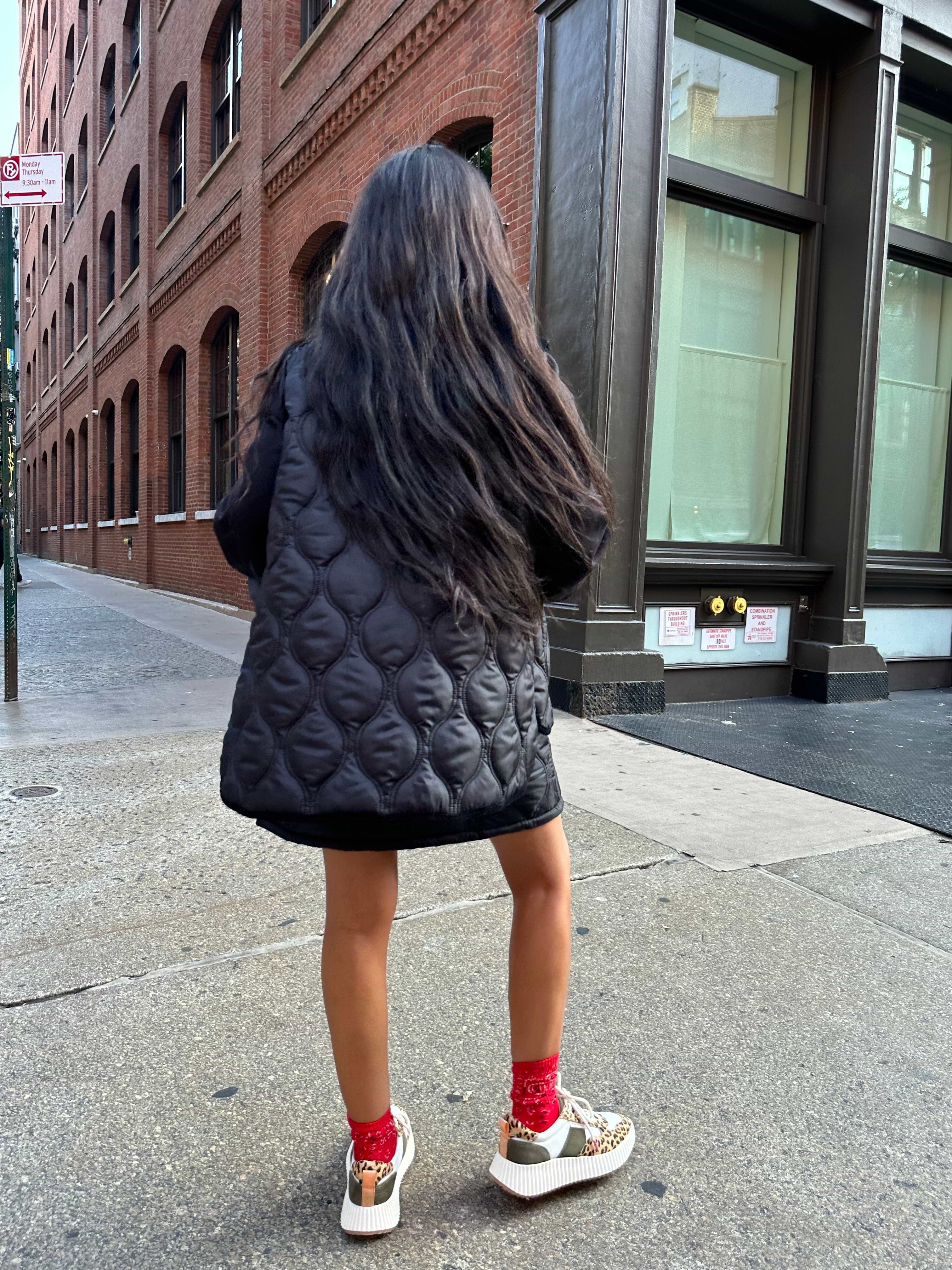 From the back Model wearing Black And Leopard Multi-Wear Jacket