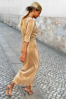 Thumbnail for Model wearing gold plisse dress