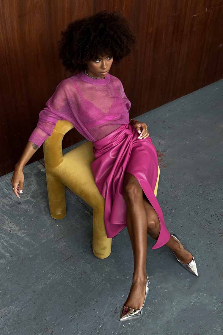 Model wearing Magenta Vegan Leather Jaspre Skirt 