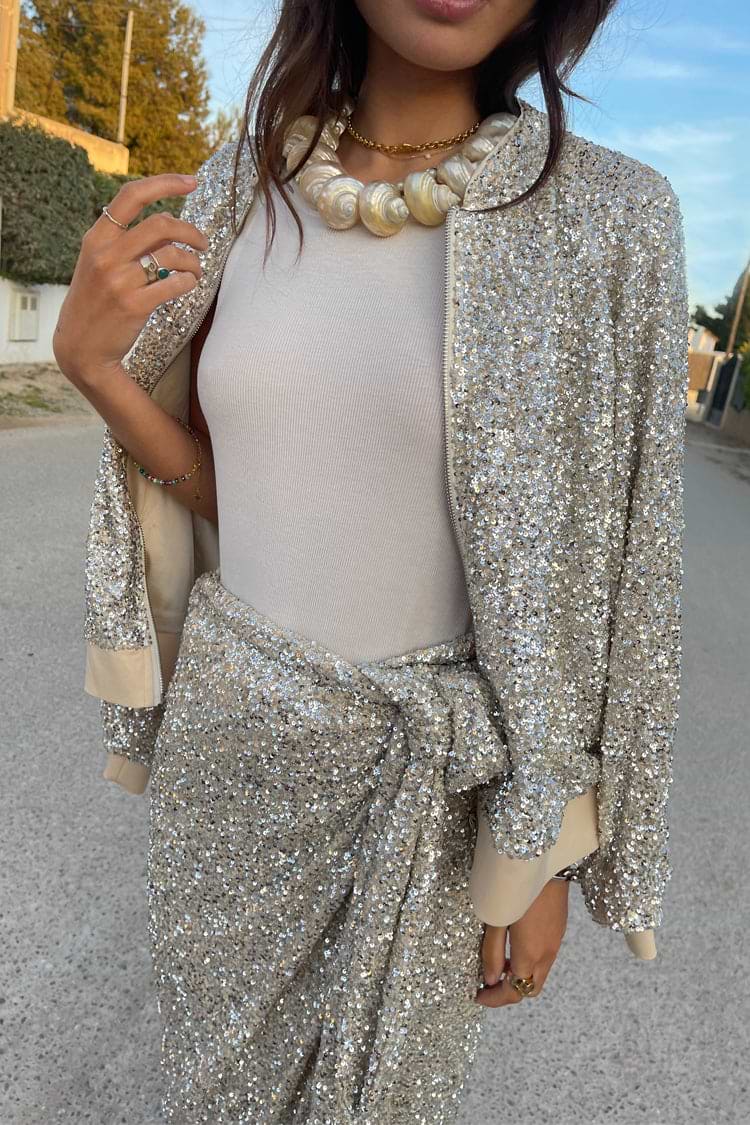 model wearing Sequin Bomber off the shoulder 