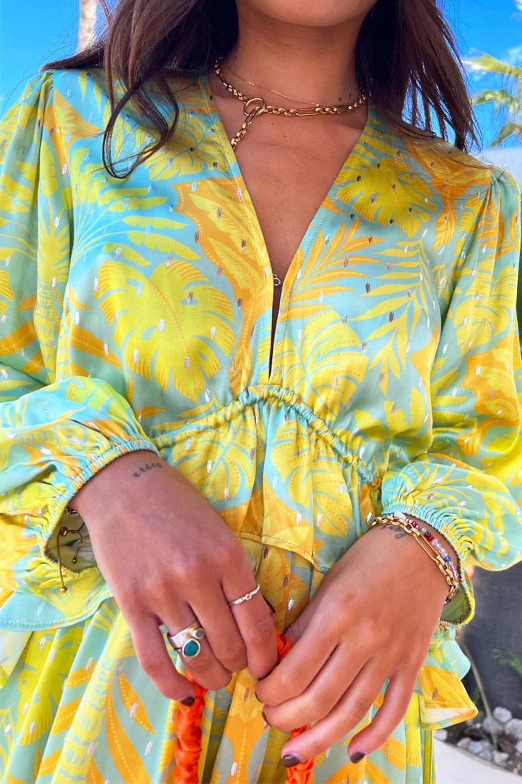 Model wearing Blue Palm Mini Swirl Dress
