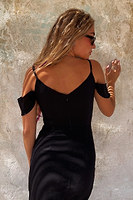 Thumbnail for caption_Model wears Black Cassie Dress in UK size 10/ US 6