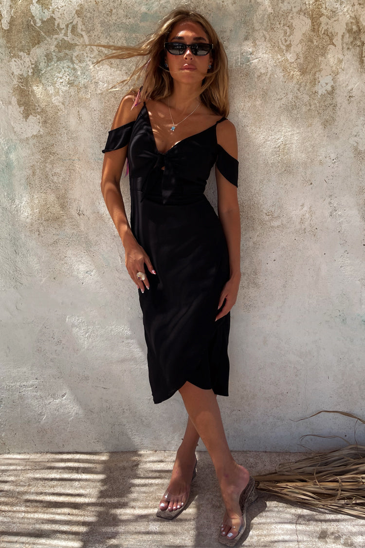 caption_Model wears Black Cassie Dress in UK size 10/ US 6