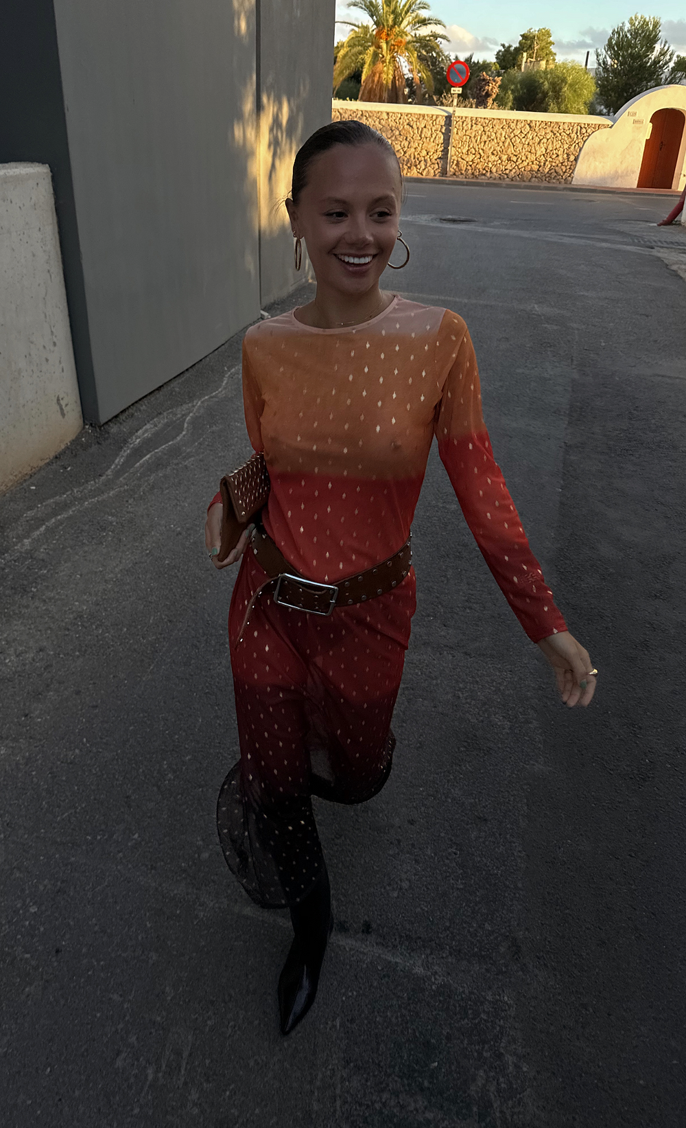 model is wearing sunset mesh dress 