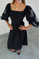 Thumbnail for caption_Model wears Black Enchanted Belle Dress in UK size 8/ US 4