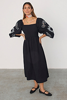 Thumbnail for caption_Model wears Black Enchanted Belle Dress in UK size 8/ US 4