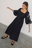 Thumbnail for caption_Model wears Black Enchanted Belle Dress in UK size 8/ US 4