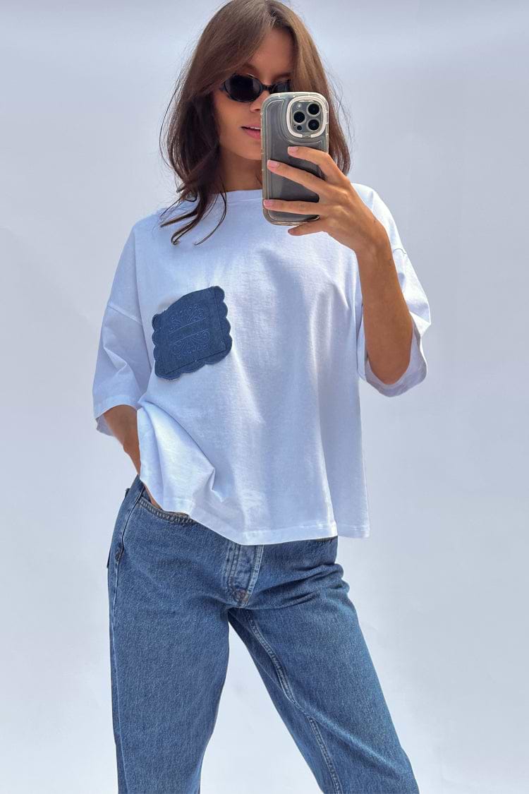 caption_Model wears  White Denim Pocket T-shirt in UK size 10/ US 6