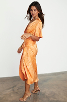 Thumbnail for caption_Model wears Apricot Palm Vienna Dress in UK size 10/ US 6