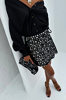 Thumbnail for caption_Model wears Black Beaded Mirror Skirt in size S