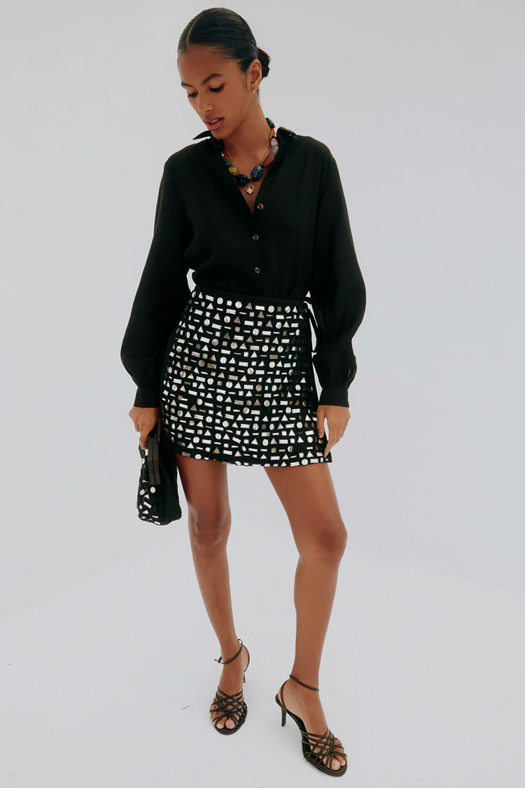 caption_Model wears Black Beaded Mirror Skirt in size S