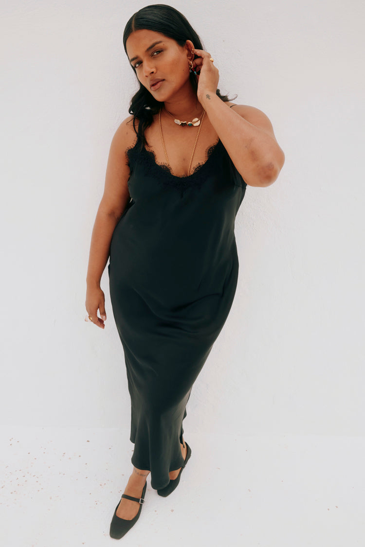 caption_Model wears Black Lace Asha Dress in UK size 16/ US 12