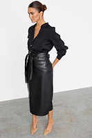 Thumbnail for caption_Model is wearing Black Vegan Leather Jaspre Skirt in UK 8 / US 4
