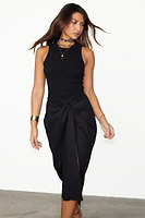 Thumbnail for caption_Model wears  Black Linen Jaspre Skirt in UK size 10/ US 6