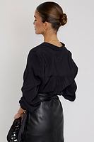 Thumbnail for caption_Model wears Black Miley Shirt in UK size 10/ US 6
