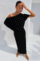 Thumbnail for caption_Model wears Black Tilly Plisse Dress with Gold Fleck in UK size 8/ US  4