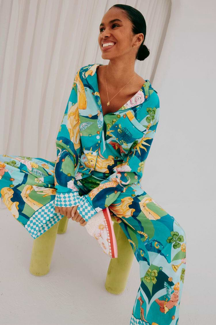 caption_Model wears  Blue Mystical Button Through Pyjamas in UK size 8/ US 4