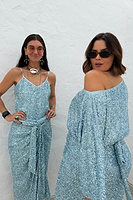 Thumbnail for caption_Model wears Blue Sequin Tilly Top in UK size 18/ US 14