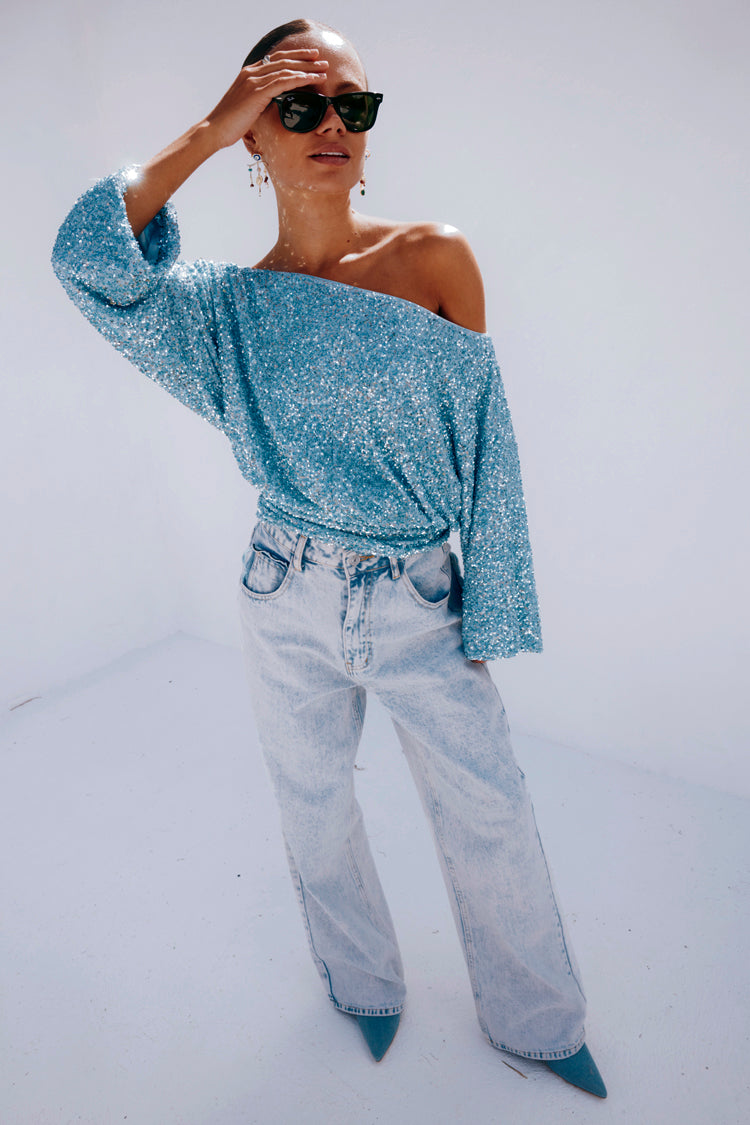 caption_Model wears Ice Blue Sequin Tilly Top in UK size 8 /US 4