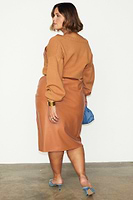 Thumbnail for caption_Model wears Camel Vegan Leather Jaspre Skirt in UK size 18/ US 14