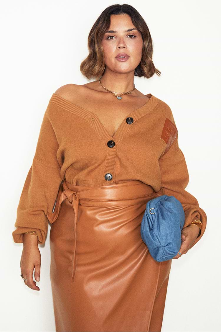 caption_Model wears Camel Vegan Leather Jaspre Skirt in UK size 18/ US 14