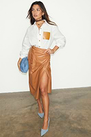 Thumbnail for caption_Model wears Camel Vegan Leather Jaspre Skirt in UK size 8/ US 4