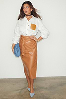 Thumbnail for caption_Model wears Camel Vegan Leather Jaspre Skirt in UK size 8/ US 4