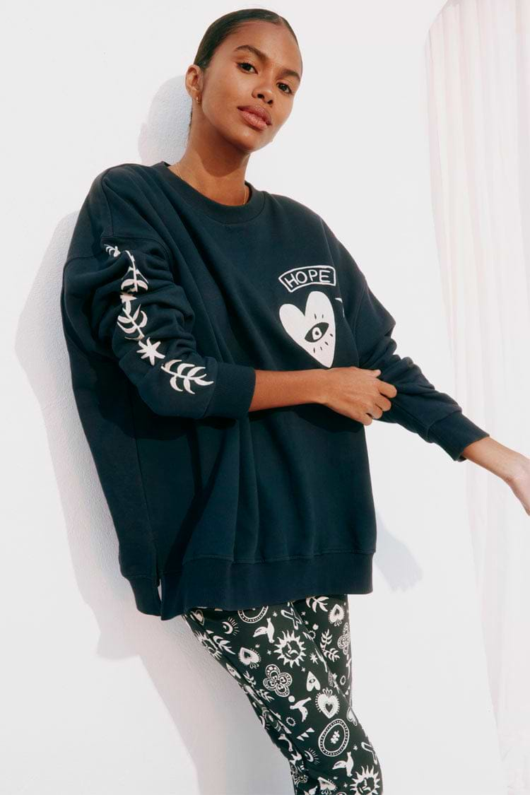 caption_Model wears Hope Charcoal Sweater  in UK size 10/ US 6