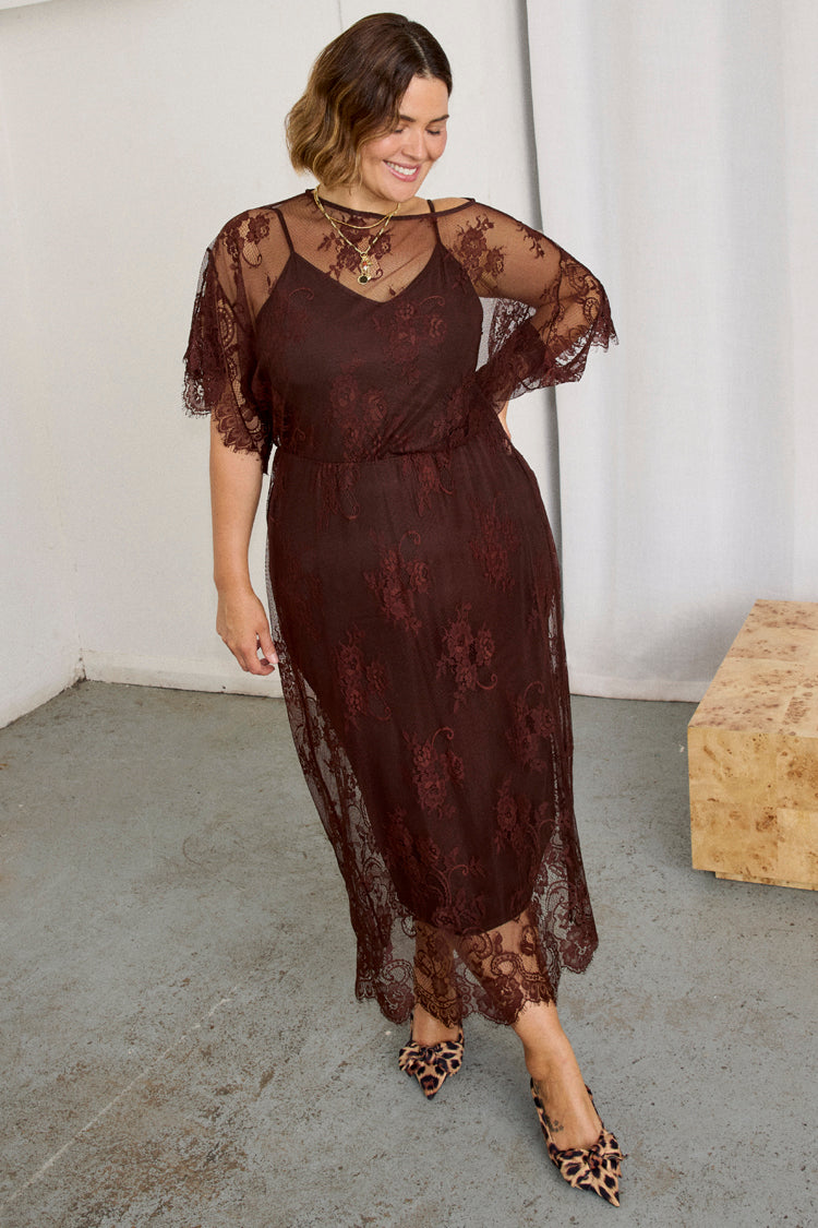 caption_Model wears Chocolate Lace Tilly Dress in UK size 18/ US 14