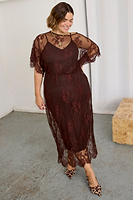 Thumbnail for caption_Model wears Chocolate Lace Tilly Dress in UK size 18/ US 14