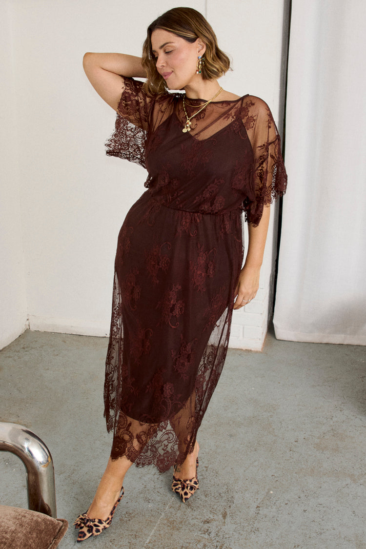 caption_Model wears Chocolate Lace Tilly Dress in UK size 18/ US 14