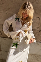 Thumbnail for  caption_Model wears Cream Sunshine Palm Miley Shirt in UK size 10/ US 6