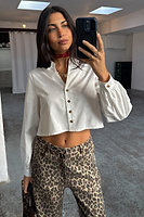 Thumbnail for caption_Model wears  White Cropped Cotton Miley Shirt in UK size 8/ US 4