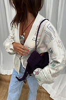 Thumbnail for caption_Model wears Cream Craft Work Cardigan in UK size M