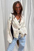 Thumbnail for caption_Model wears Cream Craft Work Cardigan in UK size M