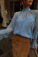 Thumbnail for caption_Model wears Pastel Blue Elinor Blouse in UK size 6/ US 2