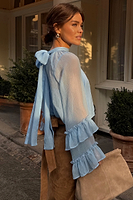 Thumbnail for caption_Model wears Pastel Blue Elinor Blouse in UK size 6/ US 2