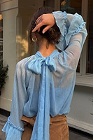 Thumbnail for caption_Model wears Pastel Blue Elinor Blouse in UK size 6/ US 2