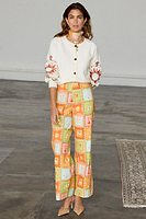 Thumbnail for caption_Model wears  Cream Enchanted Cardigan in size S