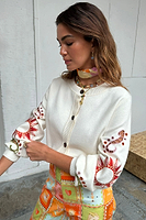 Thumbnail for caption_Model wears  Cream Enchanted Cardigan in size S