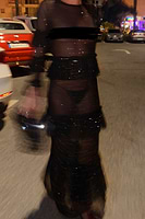 Thumbnail for caption_Model wears Black Star Mesh Felicity Dress in UK size 8/ US 4