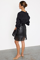 Thumbnail for caption_Model wears Black Vegan Leather Mini Fringe Jaspre Skirt in UK size 10/ US 6